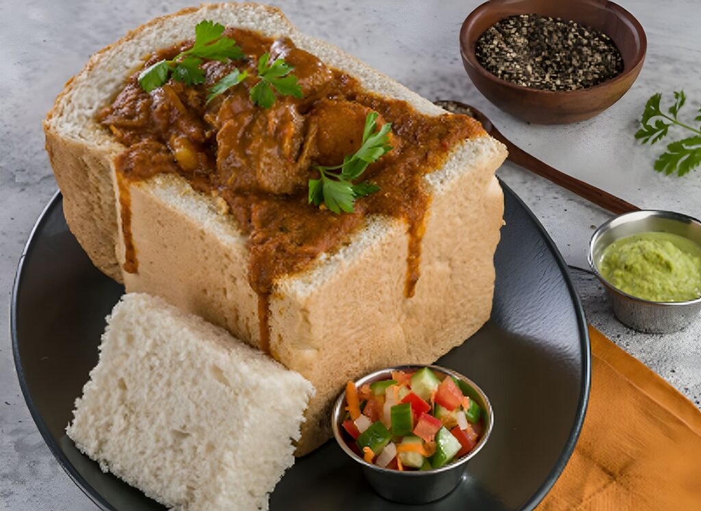 Bunny Chow served in a hollowed-out loaf of bread filled with curry, South African dish popular in Dubai.