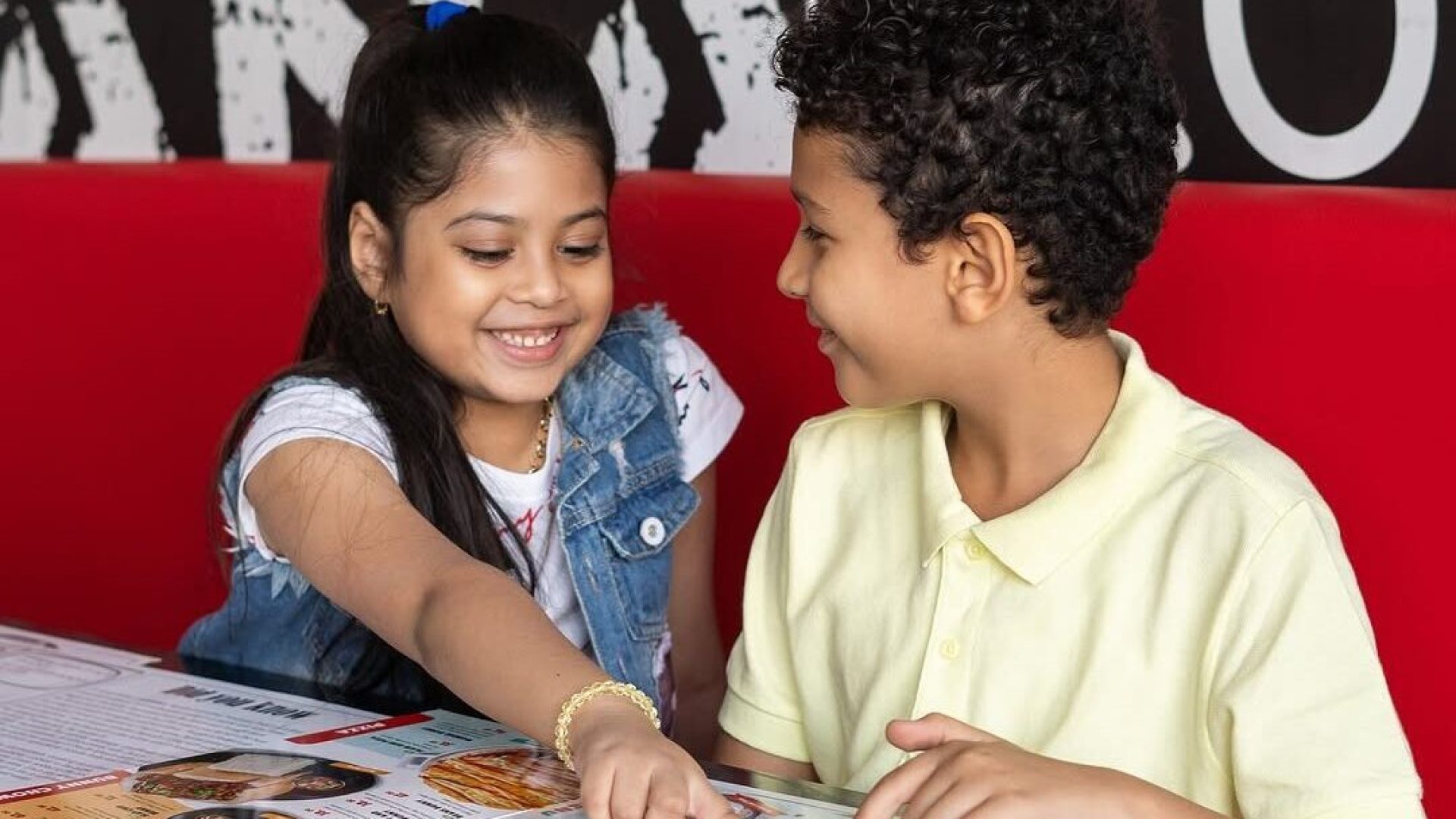 kids enjoying board game in Hyperama Diner